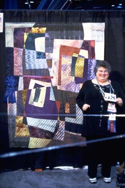 miriam-nathan-roberts-with-quilt.jpg