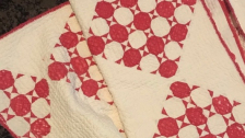 A "Popping Red" Snowball Quilt