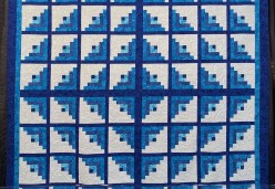 Pyramids in the Sky  by Richard W. Howard, Quilted by Dona Warnement