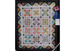 Pretty Petals by Carmen Nordback, Quilted by Becky Leitch - On Display at AQS QuiltWeek Paducah 2024