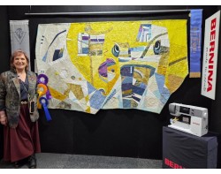 Eve of Destruction by Sue de Vanny - Sue with her Quilt (Photo From Craft.Events Facebook Page)