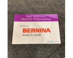 Best Stationary Machine Workmanship (Sponsored by BERNINA) Sign at AQS QuiltWeek Paducah 2019 Best Stationary Machine Workmanship (Sponsored by BERNINA) Sign at AQS QuiltWeek Paducah 2019