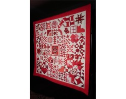Ruby Jubilee by Ninigret Quilters, Assembled by Tina Craig, Quilted by Pat Harrison - Angled View
