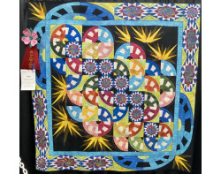 Gyrolicious by QUTI (Quilting Under The Influence) [Photo by Ricky Tims from AQS QuiltWeek Paducah 2023]