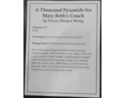 A Thousand Pyramids for Mary Beths Couch by Unknown Maker, Quilted by Teresa Duryea Wong - Sign