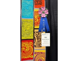 Soaring Dragon by QianNaFang Studio - First Place Group Quilts Ribbon and Sign at AQS QuiltWeek Paducah 2025