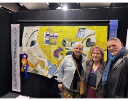 Eve of Destruction by Sue de Vanny - Sue with Beth and Trevor Reid, two of Showcase quilt judges, with her Quilt (Photo from victorianquiltersaus Instagram Page)