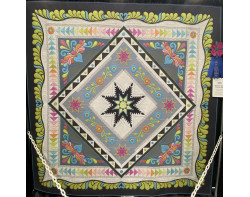 Sherbet On A Cloudy Day by Just Four Friends (Photo by Ricky Tims from AQS QuiltWeek Paducah 2023)