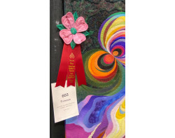 Typhoon by Janneke de Vries-Bodzinga - Second Place Wall Quilts: Stationary Machine Quilted Ribbon and Sign (Photo by Ricky Tims at AQS QuiltWeek Paducah 2023)