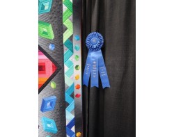 Tunnel Vision by Beth Nufer and Clem G. Buzick - First Place Pieced Ribbon at Houston International Quilt Festival 2024