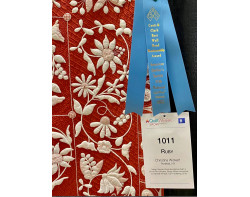 Ruby by Christine Wickert - Ribbon and Sign (Photo by Ricky Tims from AQS QuiltWeek Paducah 2023)