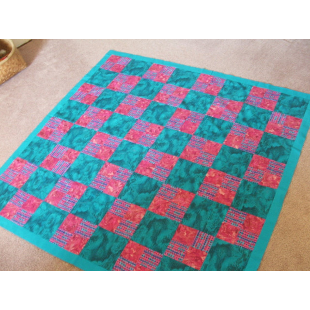 Turquoise and pink charity quilt