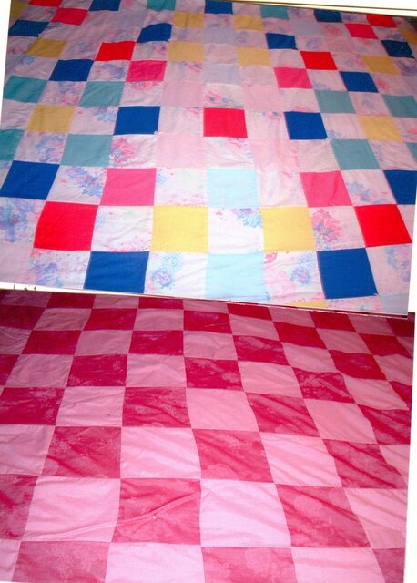 First Quilt over a wedding gift quilt