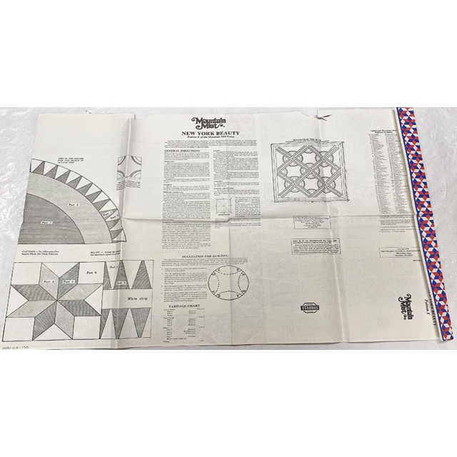 New York Beauty Variations on a Mountain Mist Batting Wrapper Pattern